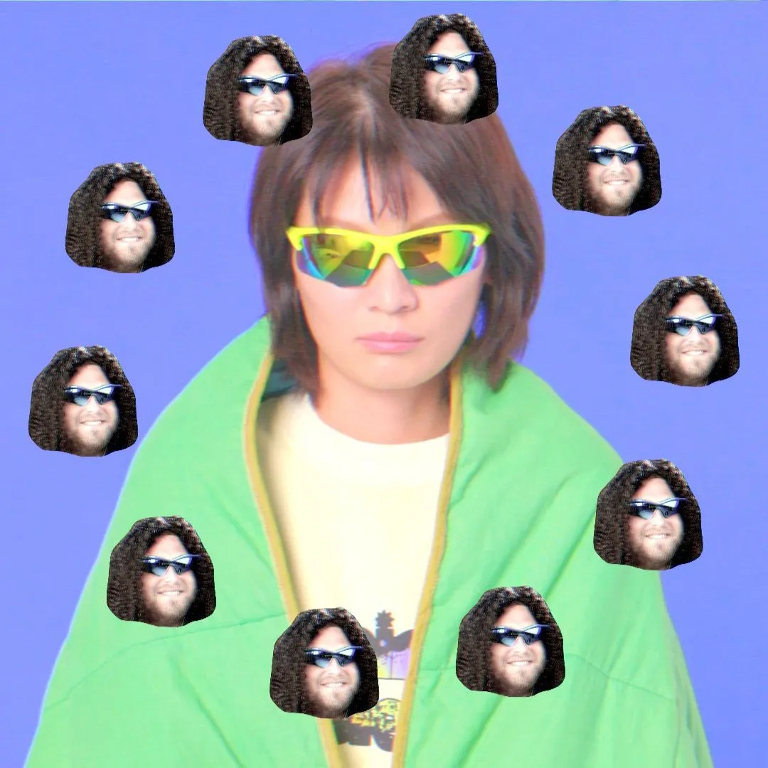 The smiling face of the Prophet appears in a ring around the face of a person wearing sunglasses